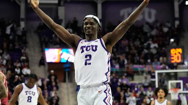 Jan 10, 2024; Fort Worth, Texas, USA; TCU Horned Frogs forward Emanuel Miller (2) reacts after scoring a three point basket against the Oklahoma Sooners during the second half at Ed and Rae Schollmaier Arena. Mandatory Credit: Chris Jones-USA TODAY Sports